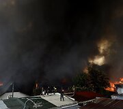 Filipinuose per gaisrą sudegė daugiau kaip 200 namų.