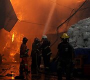 Filipinuose per gaisrą sudegė daugiau kaip 200 namų.