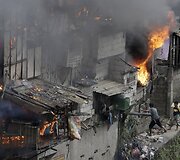 Filipinuose per gaisrą sudegė daugiau kaip 200 namų.