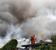 Filipinuose per gaisrą sudegė daugiau kaip 200 namų.