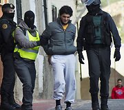 Policijos vedamas asmuo, įtariamas verbavimu į islamistų kovotojų grupuotes.