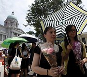 Singapūro gyventojai atidavė paskutinę pagarbą Lee Kuan Yew