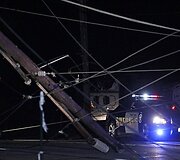 Policijos automobilis važinėja po tornado nusiaubtą Joplino miestą