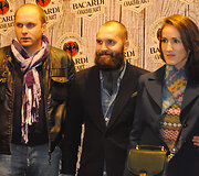 Giedrius Palauskas (centre) su žmona Aiste ir broliu Laimonu