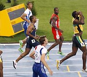 Usainas Boltas buvo diskvalifikuotas 100 metrų finale