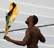 Usainas Boltas buvo diskvalifikuotas 100 metrų finale