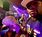 Floydas Mayweatheris ir dolerių vėduoklė