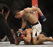 Jose Aldo ir Maxas Holloway