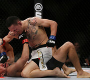Jose Aldo ir Maxas Holloway
