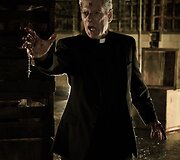Stephenas Langas filme &bdquo;Apsėstieji&ldquo;