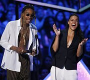 Wizas Khalifa ir Michelle Rodriguez 