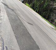 Pernai rudenį asfaltuota Žaliųjų ežerų gatvės dalis neatrodo labai gerai