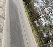Pernai rudenį asfaltuota Žaliųjų ežerų gatvės dalis neatrodo labai gerai