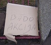 Plakatas apie bado akciją