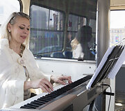 Akcijos &bdquo;Opera troleibuse&ldquo; akimirka