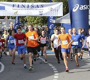 Nidos pusės maratono bėgimas