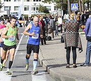Nidos pusės maratono bėgimas