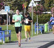 Nidos pusės maratono bėgimas