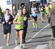 Nidos pusės maratono bėgimas