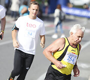 Nidos pusės maratono bėgimas