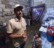 Faezo ir jo &scaron;eimos gyvenimas garaže