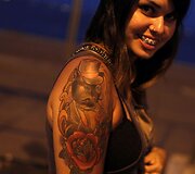 Tatuiruočių ir pirsingo konferencijos akimirka