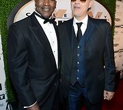 Boksininkas Evanderis Holyfieldas (kairėje) ir operos solistas Andrea Bocelli