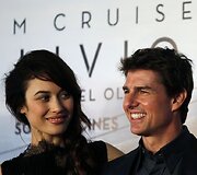Olga Kurylenko ir Tomas Cruise'as