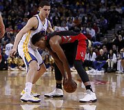 Klay Thompsonas ir Rudy Gay