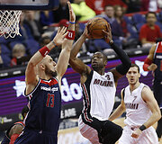 Marcinas Gortatas ir Dwyane'as Wade'as