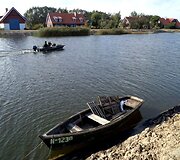 Vanduo laivus kelia ant krantinių