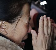 &bdquo;Malaysia Airlines&ldquo; lėktuvo keleivių artimieji Pekine