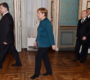 Petro Poro&scaron;enka, Angela Merkel ir Vladimiras Putinas