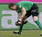 Kiaunė futbolo stadione &Scaron;veicarijoje.