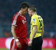 Mario Mandžukičius ir Kevinas Grosskreutzas