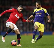 Chrisas Smallingas ir Wayne'as Routledge'as