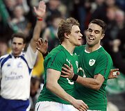 Andrew Trible'as ir Conoras Murray