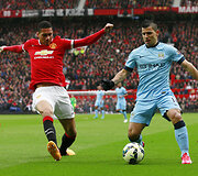 Chrisas Smallingas ir Sergio Aguero