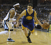 Mike'as Conley ir Klay Thompsonas
