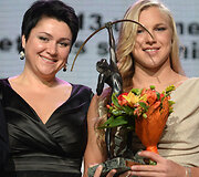 2014 m. sausis, Daina Gudzinevičiūtė įteikė metų sportininkės titulą Rūtai Meilutytei