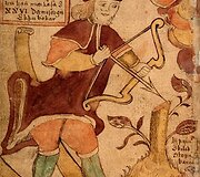 Senovinis pie&scaron;inys, vaizduojantis pagoni&scaron;ką skandinavų dievą Ulį (arba Ulą) su slidėmis