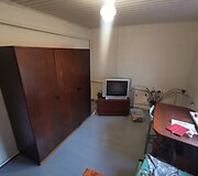 Kambarys prie&scaron; ir po atnaujinimo