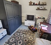 Kambarys prie&scaron; ir po atnaujinimo