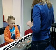 Yamaha muzikos mokyklos nuotrauka.