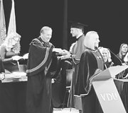 Diplomo teikimas Martynui Kavaliauskui