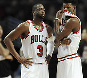 Dwyane'as Wade'as (3) ir Jimmy Butleris