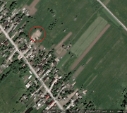 Kazbėjų (Vilniaus m.) pievoje esančios &scaron;iuk&scaron;lės 2011 m. i&scaron; palydovo darytoje nuotraukoje 