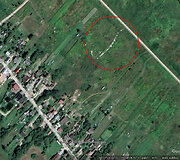 Kazbėjų (Vilniaus m.) pievoje esančios &scaron;iuk&scaron;lės 2022 m. i&scaron; palydovo darytoje nuotraukoje 