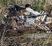 Keliasde&scaron;imt metų Asvejos ežero pa&scaron;onėje veikiantis nelegalus sąvartynas 