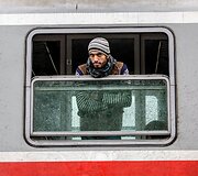 Migrantų portretai Tovarniko (Kroatija) geležinkelio stotyje